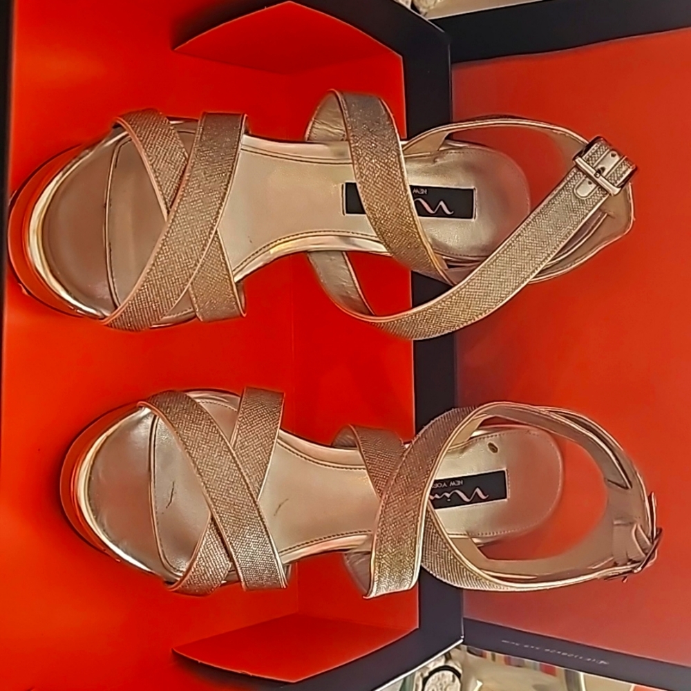 Nina 4 1/2 inch heels with cute glitter straps that wrap around the ankle.